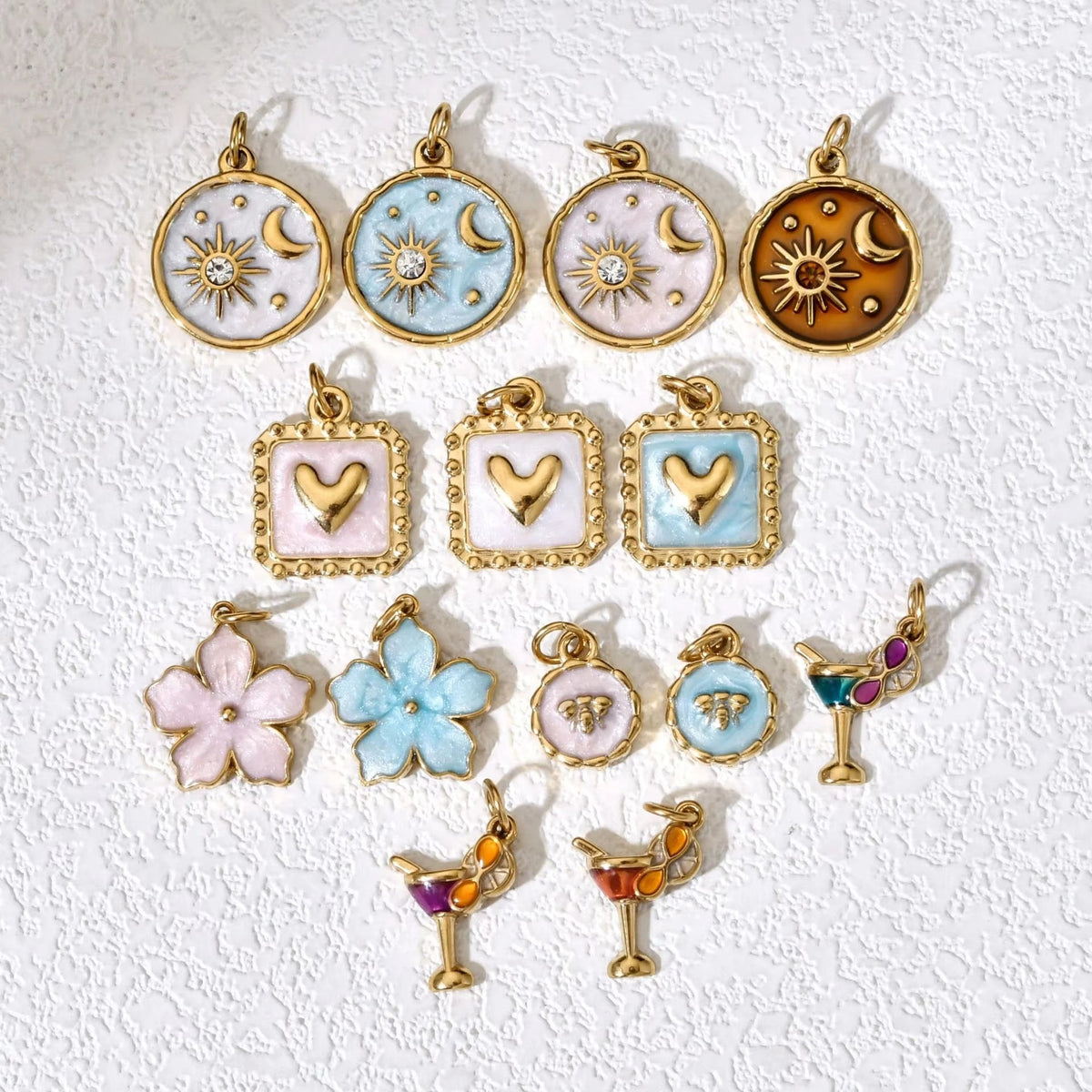Sun and moon enamel charm