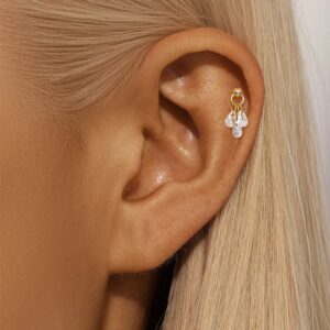 Gold stud earring with dangling teardrop-shaped crystals, showcasing a modern and elegant charm.