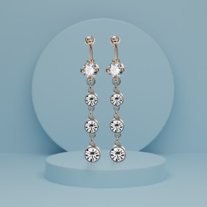 Golden Cascade Spark Earrings with a round-cut crystal stud and linked crystal drops, offering an elegant and refined look.