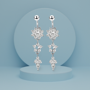 Silver cascading earrings with intricate crystal snowflake-inspired designs, elegantly dangling from a polished silver stud.